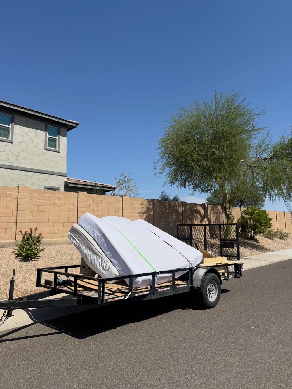 Mattresses loaded and strapped on EJ's trailer