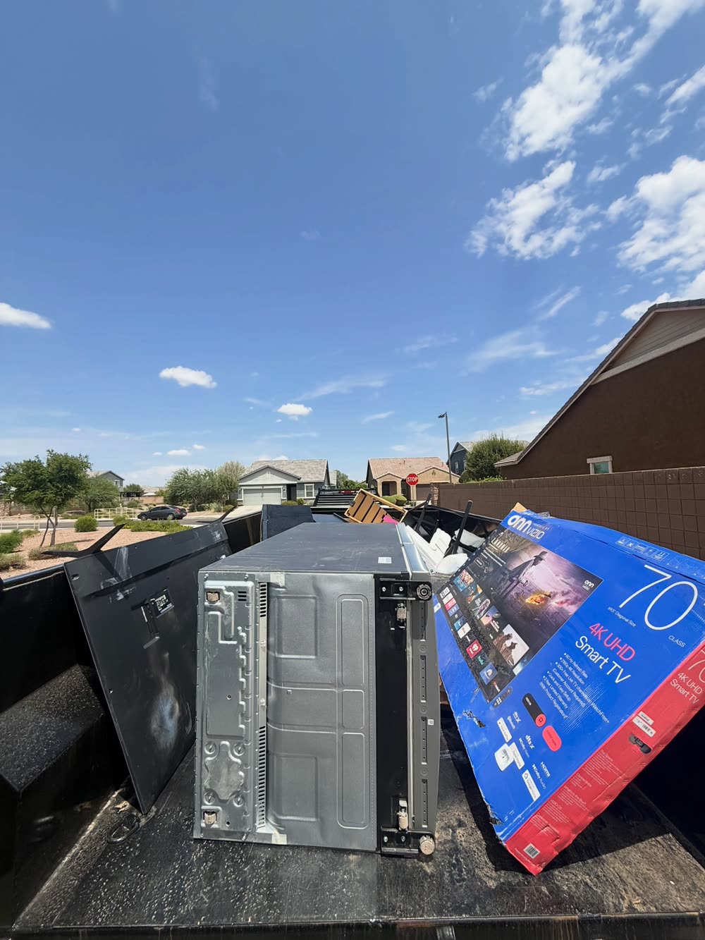 Electronics and household junk loaded on the trailer